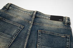 Hole Scratched Jean