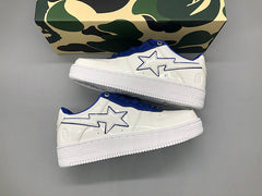 A Bathing APE  white & navy patent leather sneakers