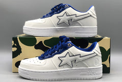 A Bathing APE  white & navy patent leather sneakers